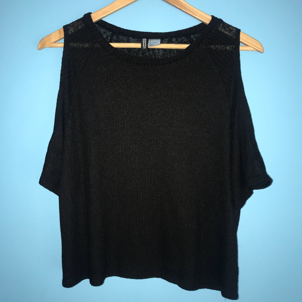 Black knitted shirt with open shoulders